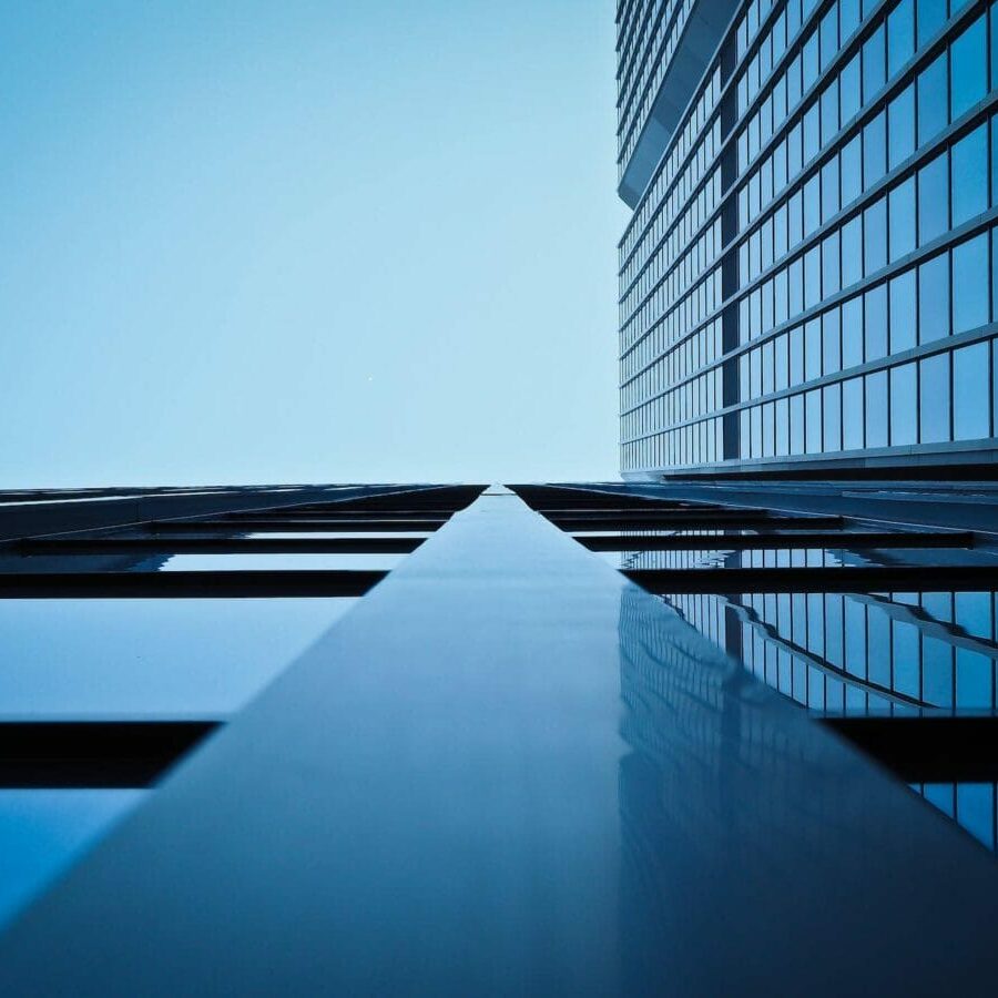 low angle view of office building against clear sky