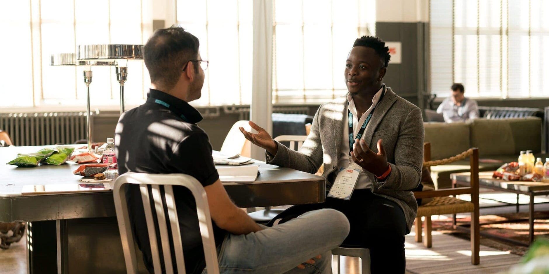 photo of men having conversation