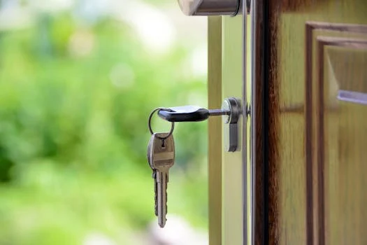 House key in front door